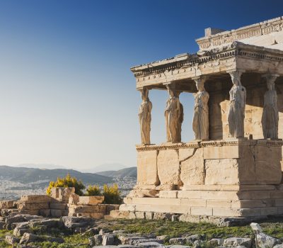 Image for Cariatides Porch, Erechtheion on Acropolis of Athens against blue sky - Edgewood Travel