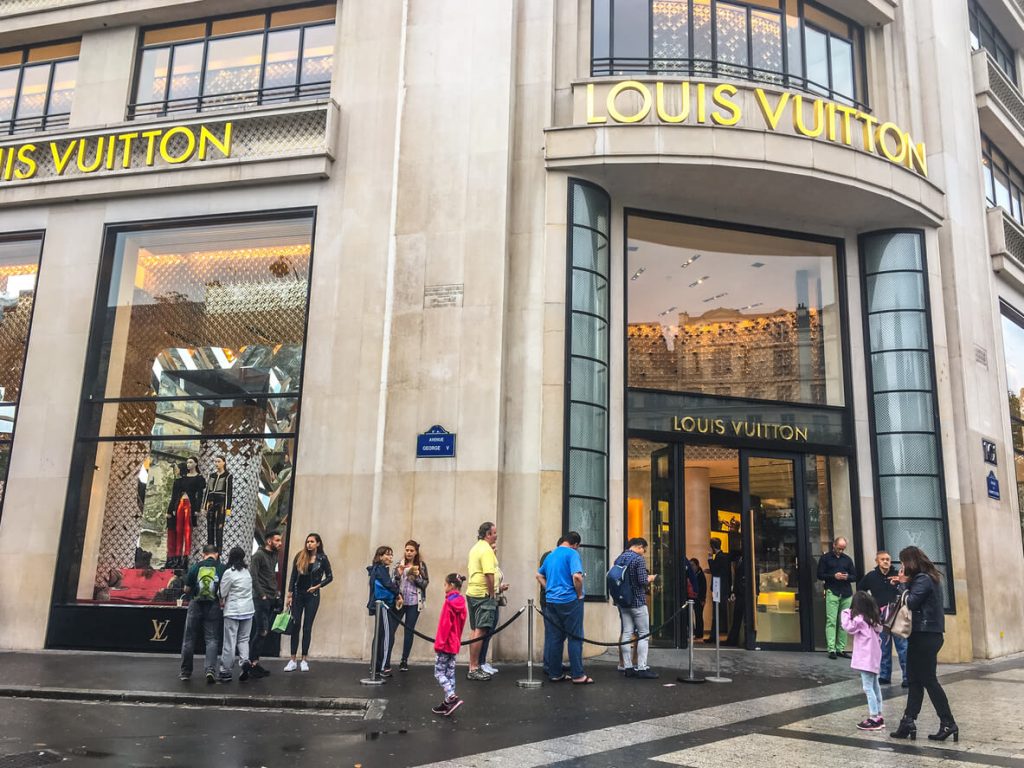 People lined up outside the Louis Vuitton store on Avenue George V in Paris.